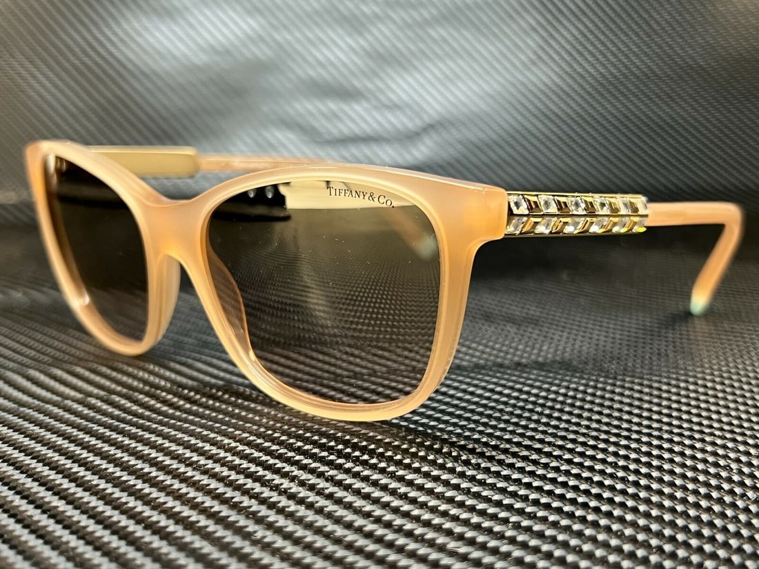 Tiffany TF4174B 82633C Brown Frame Women's Sunglasses 56mm: Tiffany TF4174B 82633C Brown Frame Women's Sunglasses 56mm Elevate your style with these Tiffany & Co. women's sunglasses, model TF4174B 82633C. Featuring a chic brown frame, these sunglasses are perf