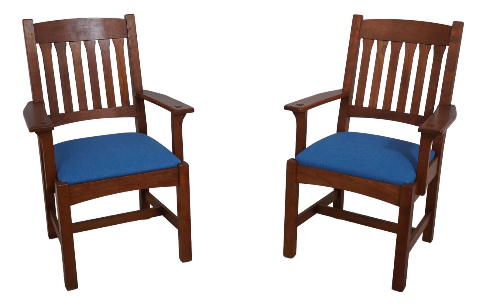 Stickley Cherry Armchairs Pair Arts & Crafts Style C.2002: Stickley Cherry Armchairs Pair Arts & Crafts Style C.2002 This pair of Stickley Mission cherry armchairs embodies the timeless Arts & Crafts style, crafted from solid cherry wood with an exquisite fin