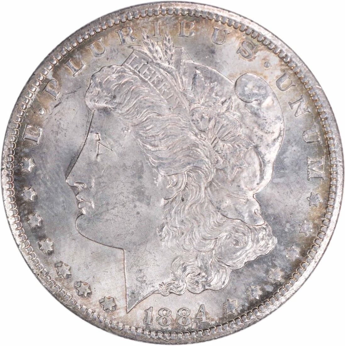 1884-CC Morgan Silver Dollar Brilliant Uncirculated Silver Coin: 1884-CC Morgan Silver Dollar Brilliant Uncirculated Silver Coin This 1884-CC Morgan Silver Dollar is a remarkable piece, showcasing the classic design of this iconic coin. It is categorized as Uncircu