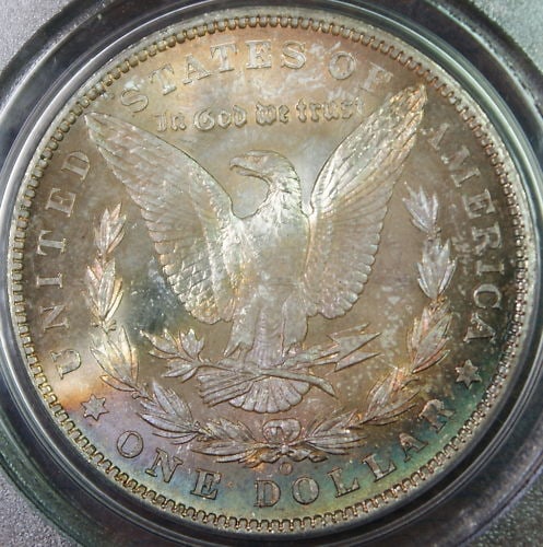 1904-O Morgan Silver Dollar Coin PCGS MS-63 Uncirculated: 1904-O Morgan Silver Dollar Coin PCGS MS-63 Uncirculated This 1904-O Morgan Silver Dollar Coin showcases a stunning design, certified by PCGS with a grade of MS-63. Struck at the New Orleans mint, thi