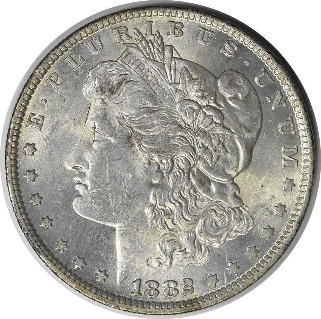 1882-O/S Morgan Silver Dollar Uncirculated BU Silver Coin: 1882-O/S Morgan Silver Dollar Uncirculated BU Silver Coin This 1882-O/S Morgan Silver Dollar is an uncirculated coin featuring a classic design and high-quality finish. Struck in silver, this coin is