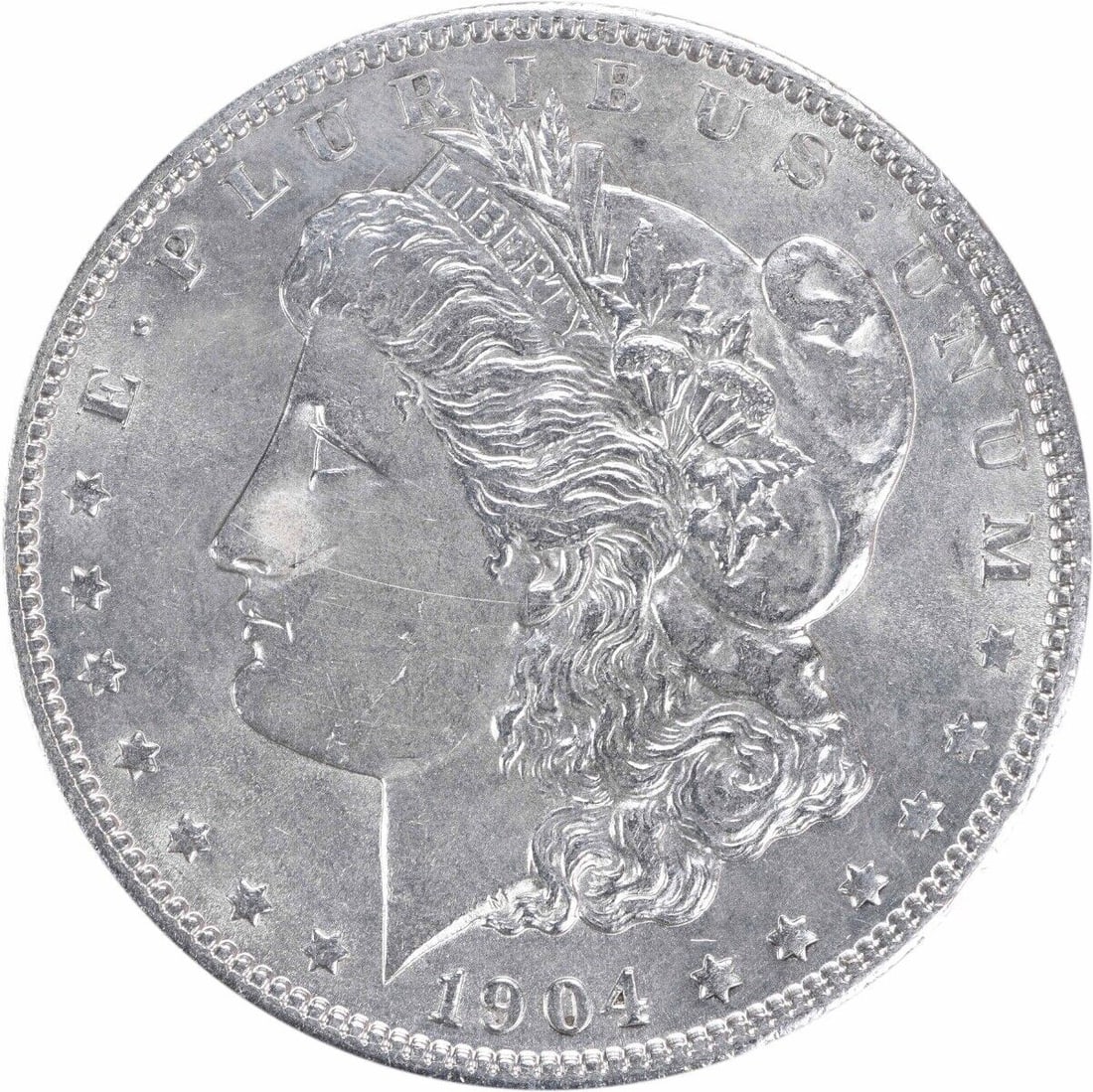 1904 Morgan Silver Dollar BU Uncirculated Coin Silver: 1904 Morgan Silver Dollar BU Uncirculated Coin Silver This is a 1904 Morgan Silver Dollar, an iconic piece of American numismatics. This coin is uncirculated and features a bright, brilliant uncircula