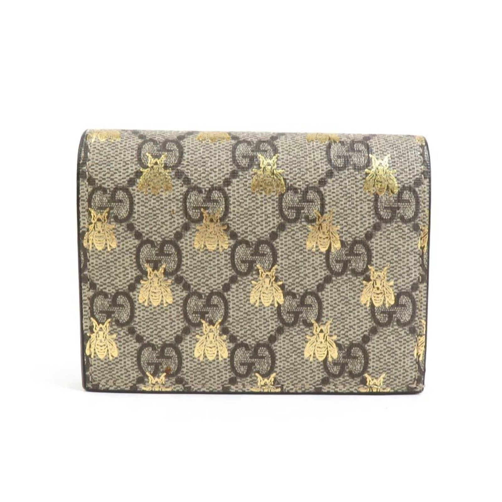 Gucci Bi-Fold Wallet GG Supreme Bee Beige Brown Gold 3.14 x 4.13 x 0.78: Gucci Bi-Fold Wallet GG Supreme Bee Beige Brown Gold 3.14 x 4.13 x 0.78 This elegant bi-fold wallet from Gucci features the iconic GG Supreme pattern adorned with a striking bee motif. Crafted from du