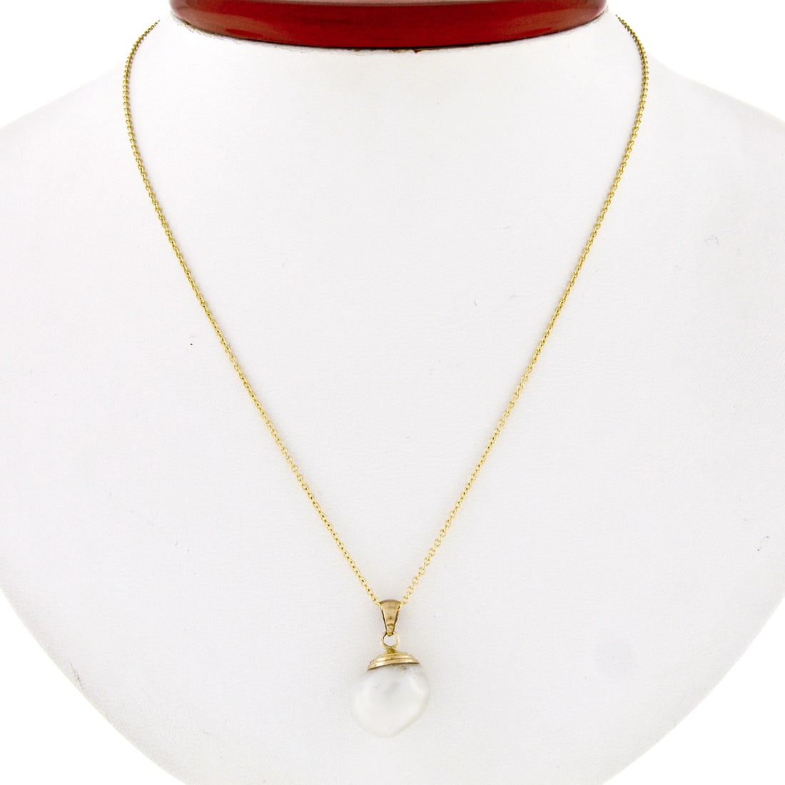 GIA Certified 14K Yellow Gold Baroque Pearl Pendant Necklace 18 Inch: GIA Certified 14K Yellow Gold Baroque Pearl Pendant Necklace 18 Inch This exquisite pendant features a GIA-certified semi-baroque freshwater pearl elegantly mounted on a solid 14K yellow gold cap. The