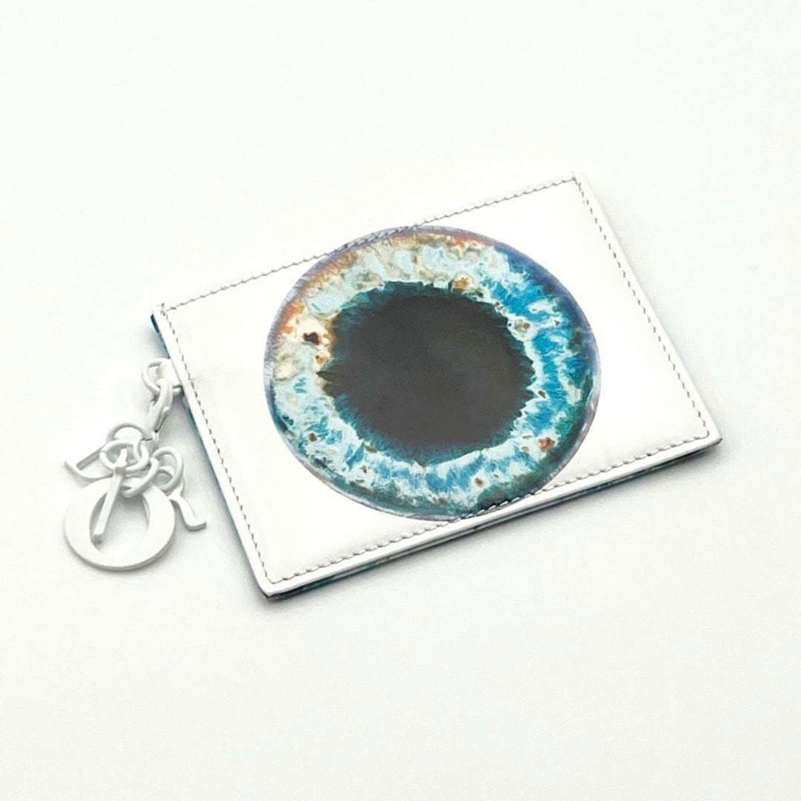 Christian Dior Men's White Leather Card Case Marc Quinn Collaboration: Christian Dior Men's White Leather Card Case Marc Quinn Collaboration This stylish card case from Christian Dior is part of the Marc Quinn collaboration, designed specifically for men. Crafted from hi