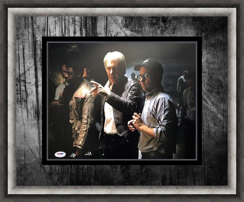 J.J. Abrams Signed Star Wars 11" x 14" Photo Custom Framed PSA COA: J.J. Abrams Signed Star Wars 11" x 14" Photo Custom Framed PSA COA This is a stunning 11" x 14" color photograph featuring J.J. Abrams, signed in black sharpie. The photograph is from the iconic movie