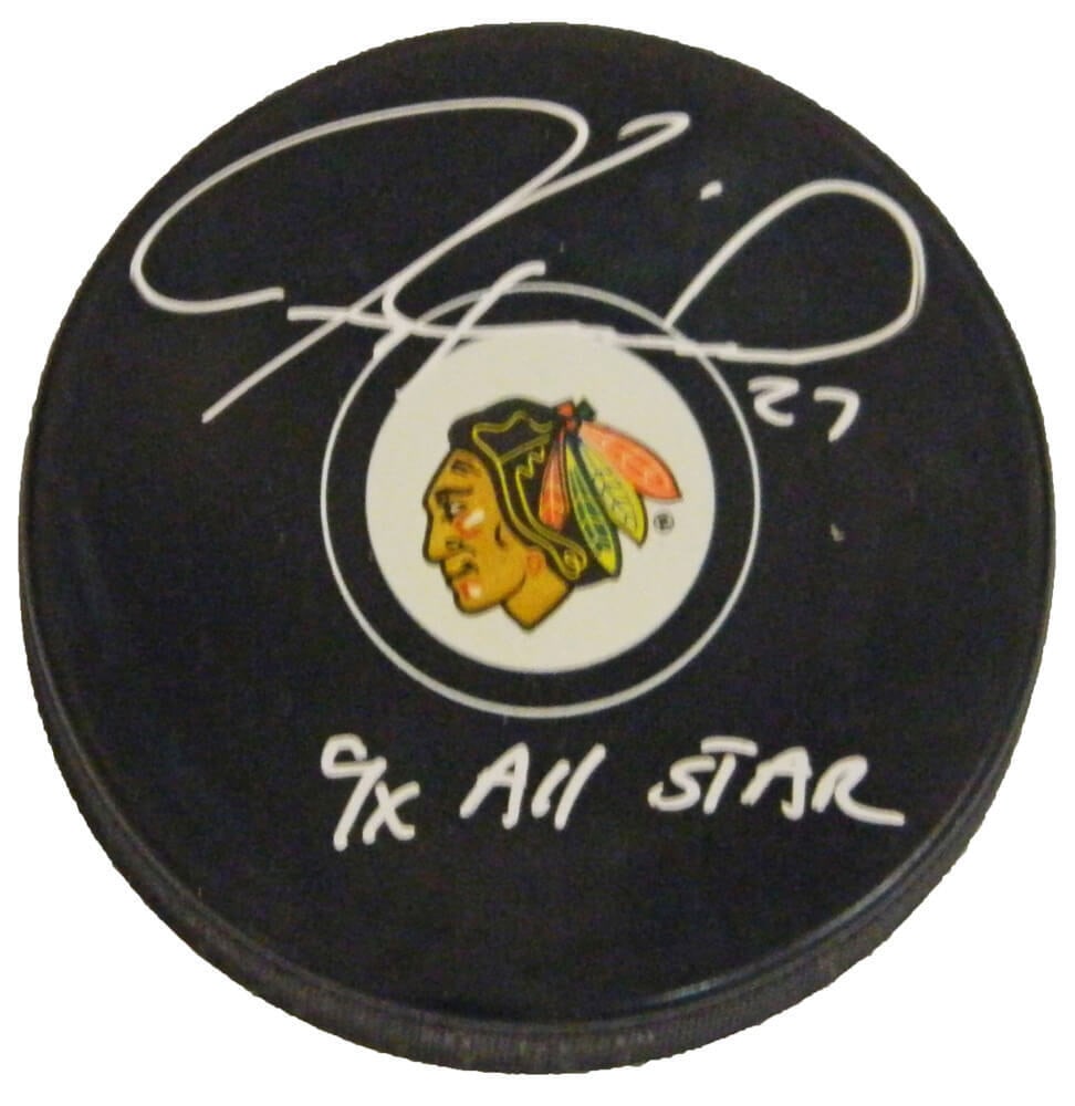 Jeremy Roenick Signed Blackhawks Puck with 9x All Star Inscription: Jeremy Roenick Signed Blackhawks Puck with 9x All Star Inscription Celebrate the legacy of hockey with this signed Chicago Blackhawks logo hockey puck featuring the autograph of Jeremy Roenick, a nota