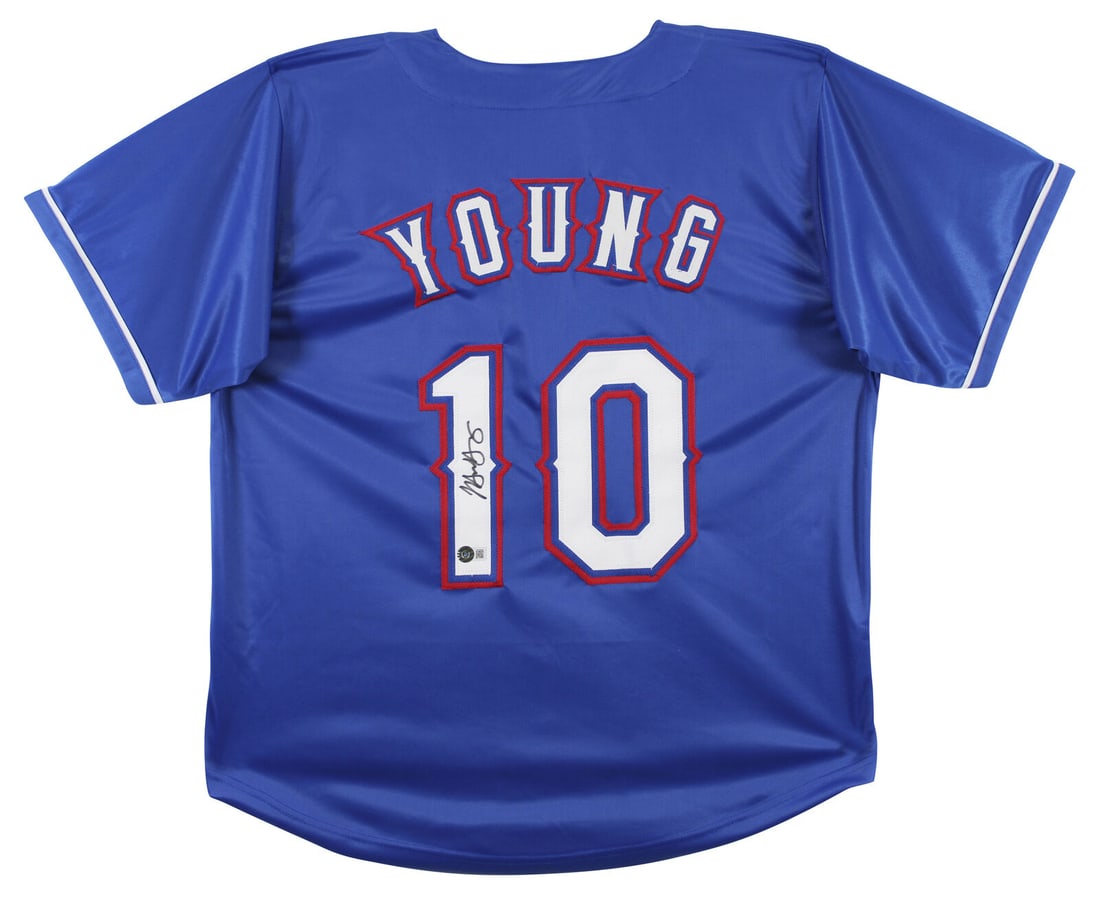 Michael Young Signed Texas Rangers Blue Pro Style Jersey BAS Authenticated: Michael Young Signed Texas Rangers Blue Pro Style Jersey BAS Authenticated This Authentic Signed Blue Pro Style Jersey has been personally signed by Michael Young of the Texas Rangers. The jersey is a