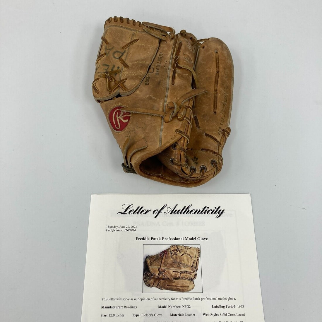 1973 Freddie Patek Signed Game Used Rawlings Baseball Glove PSA DNA COA: 1973 Freddie Patek Signed Game Used Rawlings Baseball Glove PSA DNA COA This vintage 1973 Rawlings baseball glove was game used and signed by Freddie Patek, showcasing significant wear from play. The