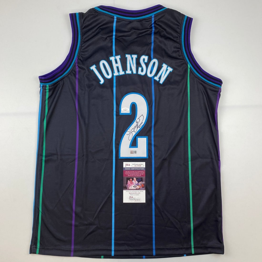 Signed Larry Johnson Charlotte Hornets Basketball Jersey JSA Authenticated: Signed Larry Johnson Charlotte Hornets Basketball Jersey JSA Authenticated Celebrate the legacy of Larry Johnson with this authentic signed Charlotte Hornets basketball jersey. This original piece sho