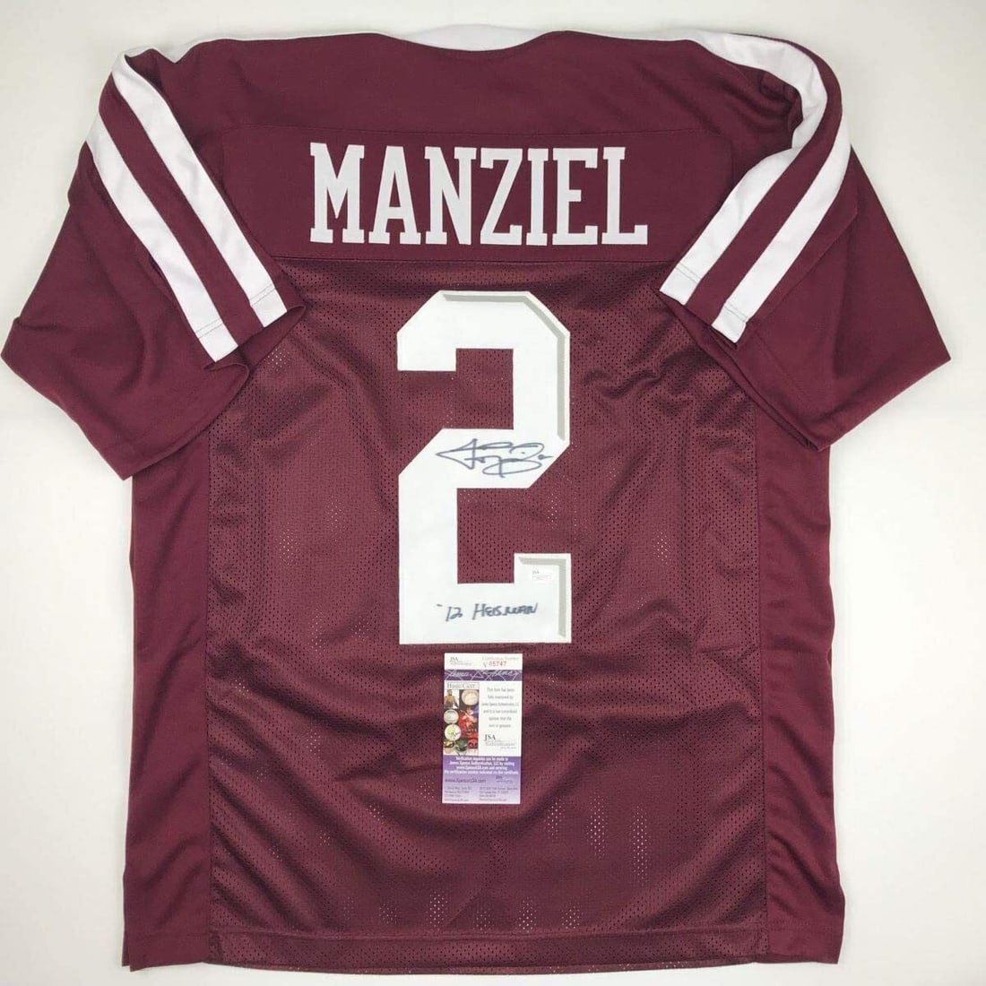 Johnny Manziel Signed Texas A&M Maroon Jersey JSA Certified: Johnny Manziel Signed Texas A&M Maroon Jersey JSA Certified This is an authentic, autographed maroon jersey from Johnny Manziel, the renowned Heisman Trophy winner from Texas A&M. The jersey is offici