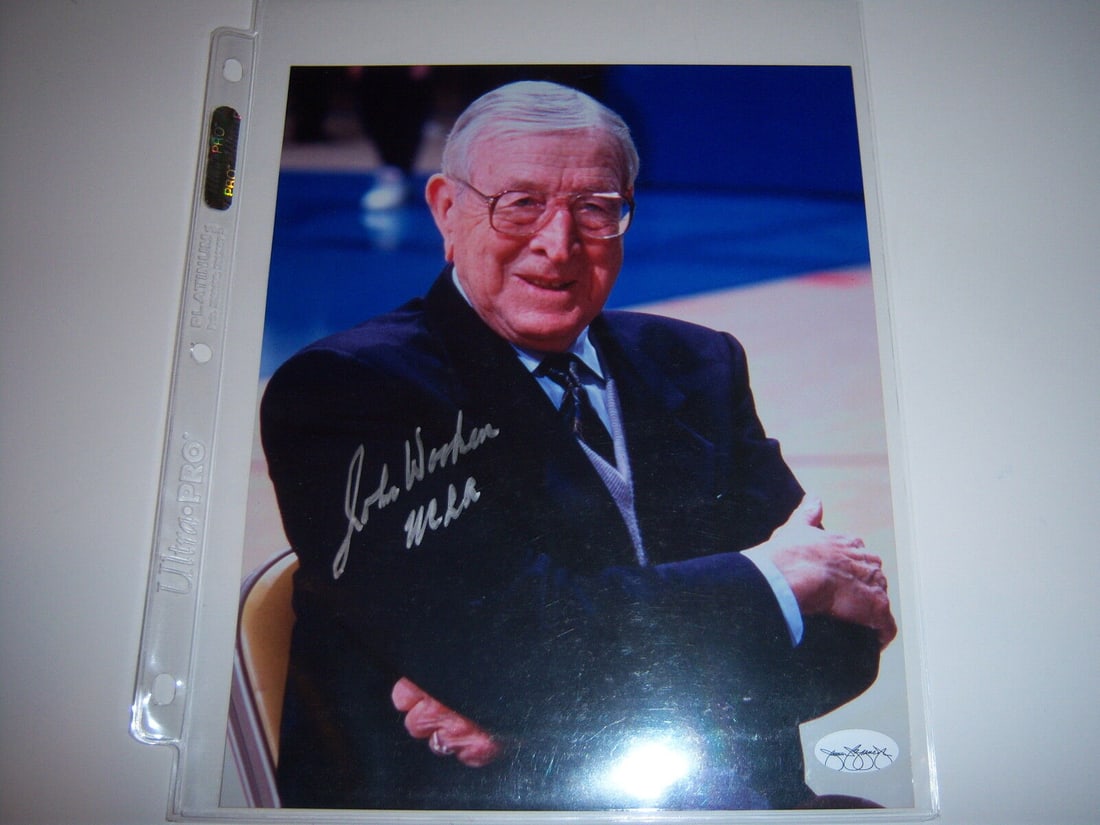 John Wooden UCLA Bruins Signed 8x10 Photo JSA COA: John Wooden UCLA Bruins Signed 8x10 Photo JSA COA This is an original 8x10 glossy photo signed by legendary basketball coach John Wooden, known for his remarkable career with the UCLA Bruins. The phot