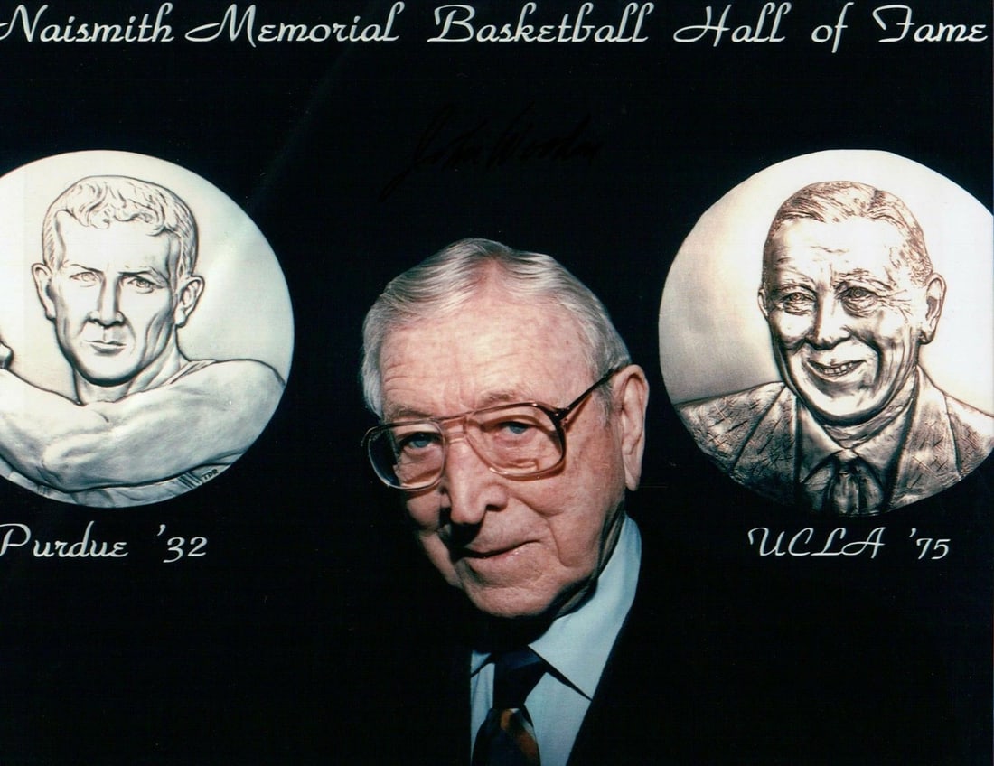 John Wooden Autographed 8x10 Photo Naismith Hall of Fame: John Wooden Autographed 8x10 Photo Naismith Hall of Fame This is an original 8x10 photograph of John Wooden, signed in black ink. The photo features a fold crease across the top right corner, which is