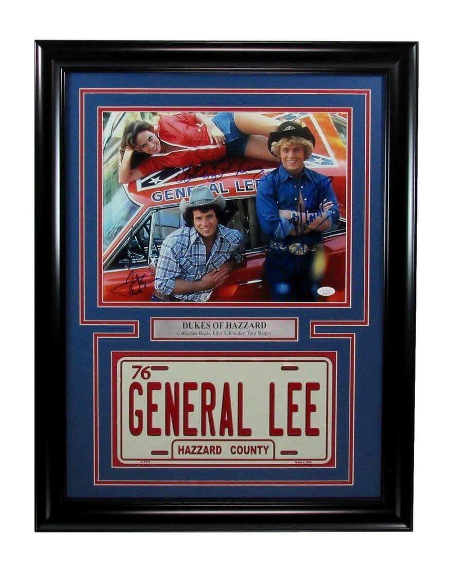 Dukes of Hazzard JSA Signed License Plate & Photo Collage Framed: Dukes of Hazzard JSA Signed License Plate & Photo Collage Framed This unique Dukes of Hazzard collectible features a signed license plate and a photo collage, beautifully framed for display. This piec