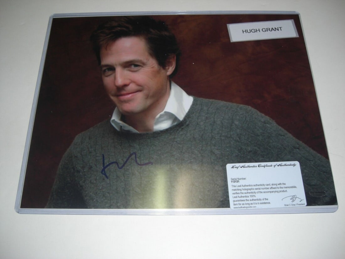 Hugh Grant Signed 11x14 Photo Notting Hill Man from U.N.C.L.E. COA: Hugh Grant Signed 11x14 Photo Notting Hill Man from U.N.C.L.E. COA This is an original 11x14 photo signed by Hugh Grant, known for his roles in 'Notting Hill' and 'The Man from U.N.C.L.E.' The photo i
