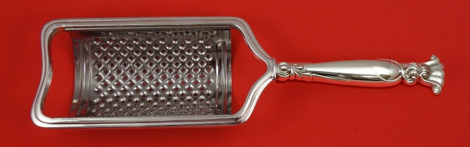 Wallace Romance of the Sea Sterling Silver Curved Cheese Grater 8.5" Custom Made: Wallace Romance of the Sea Sterling Silver Curved Cheese Grater 8.5" Custom Made Enhance your serving experience with this exquisite curved cheese grater from the Romance of the Sea pattern by Wallace