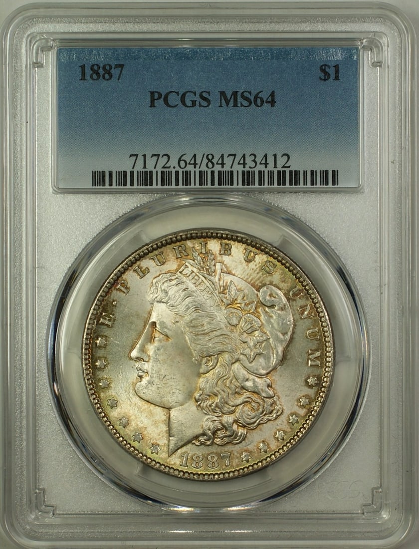 1887 Morgan Silver Dollar PCGS MS64 Uncirculated Philadelphia Silver Coin: 1887 Morgan Silver Dollar PCGS MS64 Uncirculated Philadelphia Silver Coin This 1887 Morgan Silver Dollar is a stunning example of American numismatic history, featuring a grade of MS 64 from PCGS. Min