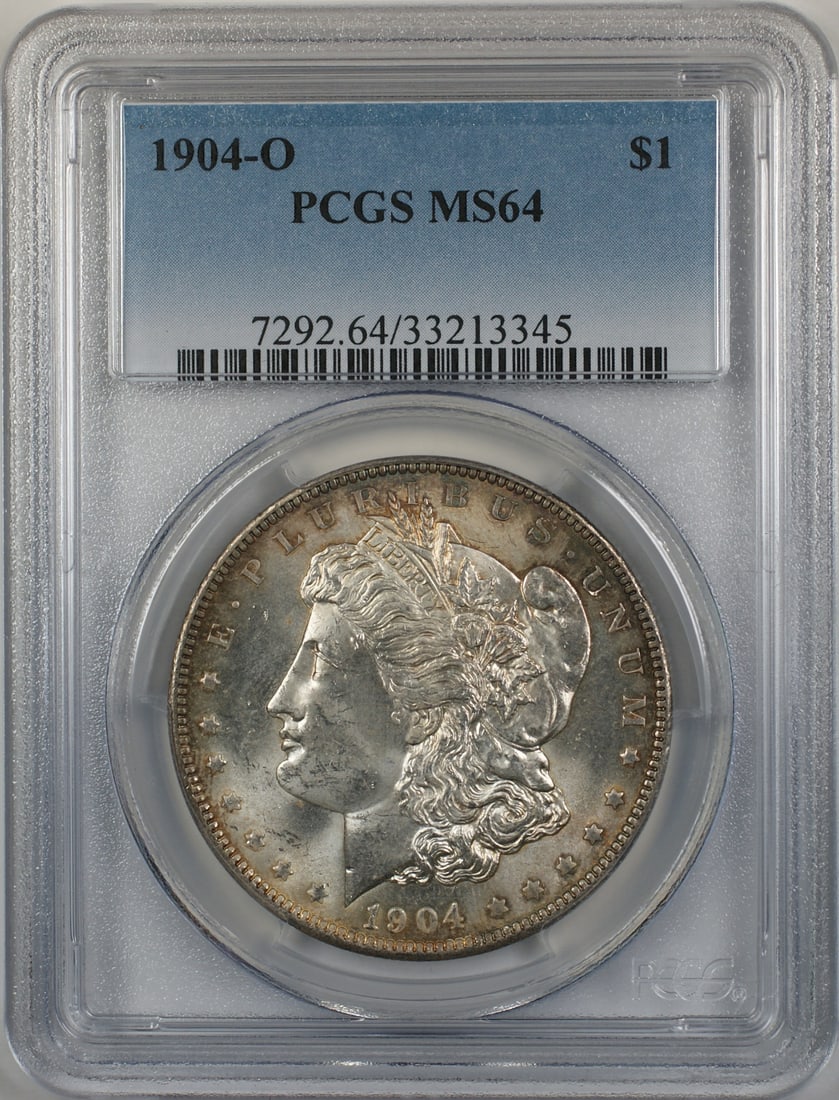 1904-O Morgan Silver Dollar Coin PCGS MS 64 Toned Silver: 1904-O Morgan Silver Dollar Coin PCGS MS 64 Toned Silver This 1904-O Morgan Silver Dollar is a stunning piece of numismatic history, certified by PCGS with a grade of MS 64. Struck in New Orleans, thi
