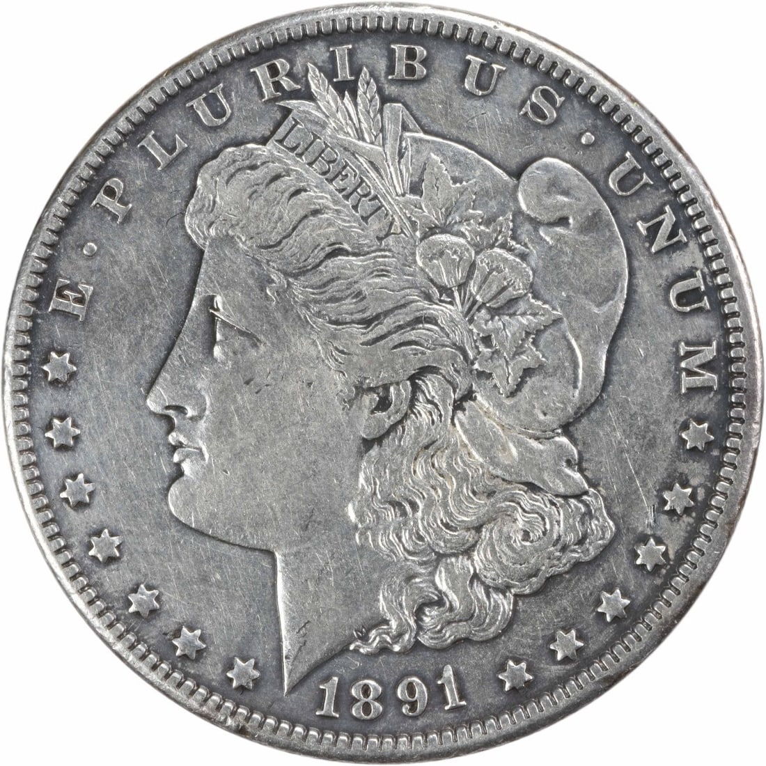 1891-CC Morgan Silver Dollar XF 90% Silver Coin by George T. Morgan: 1891-CC Morgan Silver Dollar XF 90% Silver Coin by George T. Morgan This 1891-CC Morgan Silver Dollar features exquisite craftsmanship by designer George T. Morgan. The coin is composed of 90% silver