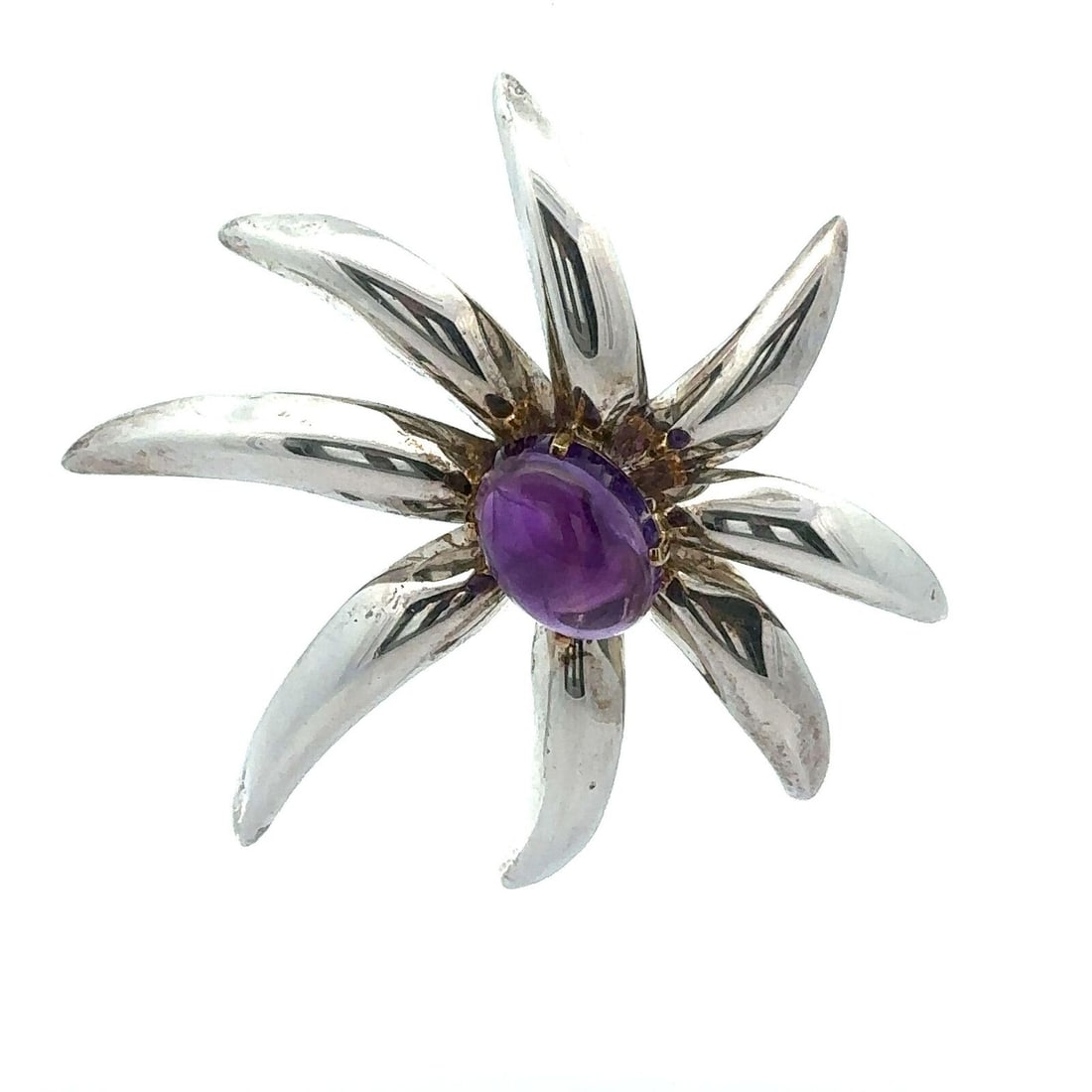 Tiffany & Co. 1995 Amethyst Cabochon Sterling Silver Gold Pin Brooch: Tiffany & Co. 1995 Amethyst Cabochon Sterling Silver Gold Pin Brooch This exquisite brooch from Tiffany & Co. features a stunning cabochon-shaped amethyst that radiates in a rich purple hue. Crafted w