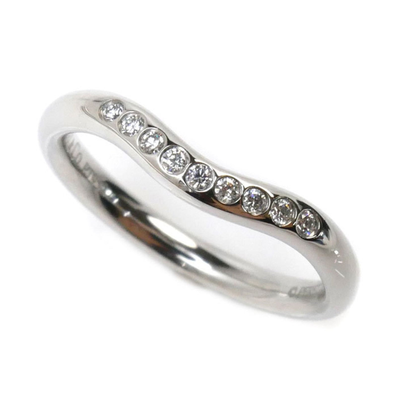 Tiffany & Co. Pt950 Platinum Diamond Band Ring 0.06ct Size 7.5: Tiffany & Co. Pt950 Platinum Diamond Band Ring 0.06ct Size 7.5 This exquisite Tiffany & Co. band ring is crafted from high-quality Pt950 platinum and features a delicate diamond, weighing 0.06 ct. Des