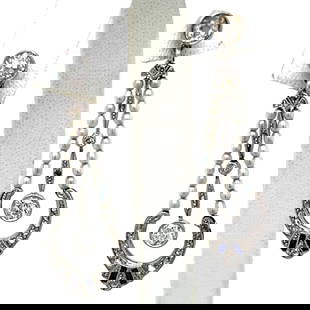 Vintage Art Deco Platinum Pearl Diamond Earrings 1.75" Length: Vintage Art Deco Platinum Pearl Diamond Earrings 1.75" Length These stunning Art Deco earrings are crafted from luxurious platinum and feature exquisite natural pearls complemented by a total of 4