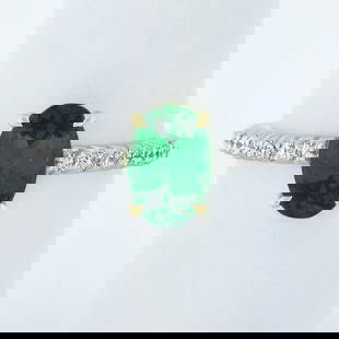 14k Multi-Tone Gold 2.07ctw GIA Oval Tsavorite & Diamond Engagement Ring 7.5: 14k Multi-Tone Gold 2.07ctw GIA Oval Tsavorite & Diamond Engagement Ring 7.5 This exquisite engagement ring features a stunning 2.07ctw oval Tsavorite garnet, radiating a rich green hue, accompanied