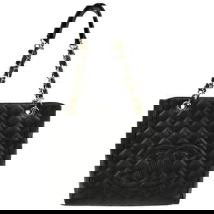 Chanel Black Caviar Petite Shopping Tote Bag with Chain Strap: Chanel Black Caviar Petite Shopping Tote Bag with Chain Strap This elegant Chanel Petite Shopping Tote combines sophistication with functionality. Crafted from luxurious black caviar skin leather,