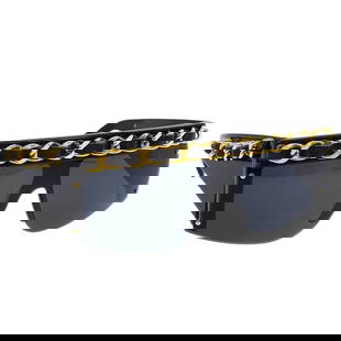 Chanel CC Logos Black Acrylic Sunglasses 01455 94305: Chanel CC Logos Black Acrylic Sunglasses 01455 94305 Elevate your eyewear collection with these stylish Chanel Chain Sunglasses. Featuring a sleek black frame made from durable plastic, these
