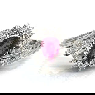 Platinum Ruby 0.59 Ct and Diamond Ring F-G VS1-SI1: Platinum Ruby 0.59 Ct and Diamond Ring F-G VS1-SI1 This exquisite Platinum Ruby & Diamond Ring showcases a stunning 0.59 Ct. ruby, complemented by 16 diamonds totaling 0.32 Ct. The diamonds are of
