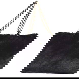 Chanel Black Fur Chain Tote Handbag with Lambskin Lining: Chanel Black Fur Chain Tote Handbag with Lambskin Lining Introducing the Chanel Black Fur Chain Tote Handbag, a stylish and versatile accessory perfect for casual occasions. This medium-sized tote