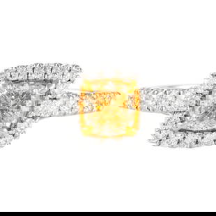 1.02ct Fancy Intense Yellow Diamond Ring 18k Two-Tone Size 6.5: 1.02ct Fancy Intense Yellow Diamond Ring 18k Two-Tone Size 6.5 This exquisite 1.02ct Fancy Intense Yellow Cushion Diamond Ring showcases a stunning cushion cut diamond with SI1 clarity, EGL graded.