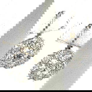 Platinum 18K Yellow Gold 2.60 Ct Diamond Earrings 1 inch: Platinum 18K Yellow Gold 2.60 Ct Diamond Earrings 1 inch Elevate your elegance with these stunning Platinum and 18K Yellow Gold Diamond Earrings, featuring a total weight of 2.60 carats. Each