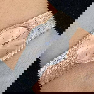 PIAGET 18K White Gold Ladies Watch with Diamond Bezel: PIAGET 18K White Gold Ladies Watch with Diamond Bezel Discover elegance with this exquisite PIAGET 18K White Gold Ladies Watch. Crafted from 18K white gold, this sophisticated timepiece weighs 52.5