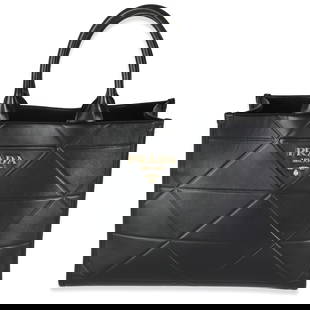Prada Medium Symbole Tote Black Leather with Gold-Tone Hardware: Prada Medium Symbole Tote Black Leather with Gold-Tone Hardware This elegant Prada Black Calfskin Medium Symbole Tote is a versatile accessory suitable for any occasion. Crafted from high-quality