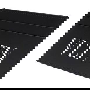 Valentino Garavani VLTN Leather Card Case Black 2 Card Holders: Valentino Garavani VLTN Leather Card Case Black 2 Card Holders Introducing the Valentino Garavani VLTN Card Case, a stylish and functional accessory designed for both men and women. Crafted from