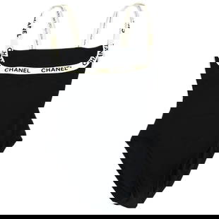 Chanel Black Sleeveless Swim Dress with Logo Size 38: Chanel Black Sleeveless Swim Dress with Logo Size 38 Elevate your swimwear collection with this elegant Chanel sleeveless dress swimsuit. Crafted from a premium blend of 80% nylon and 20% spandex,