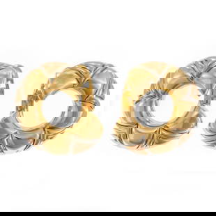 Bvlgari 18k Tri-Color Gold C-Shaped Huggie Earrings: Bvlgari 18k Tri-Color Gold C-Shaped Huggie Earrings Elevate your style with these exquisite Bvlgari huggie earrings, crafted from luxurious 18k tri-color gold. The elegant design features a polished