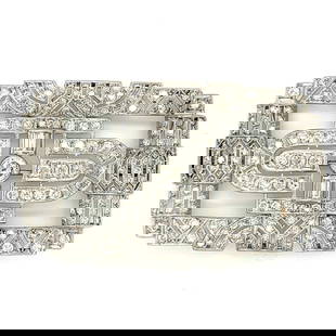 Vintage Art Deco Platinum Diamond Brooch 7.00 Ct F-H VS1-SI2: Vintage Art Deco Platinum Diamond Brooch 7.00 Ct F-H VS1-SI2 This exquisite Art Deco brooch features a stunning arrangement of approximately 7.00 carats of diamonds, showcasing F-H color and VS1-SI2