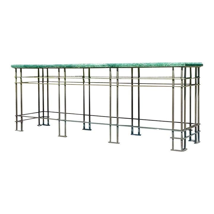 Vintage Boho Monumental Green Marble Wrought Iron Console Table: Vintage Boho Monumental Green Marble Wrought Iron Console Table Elevate your interior with this Vintage Boho Monumental Console Table. This exquisite piece boasts a stunning green marble top complemen