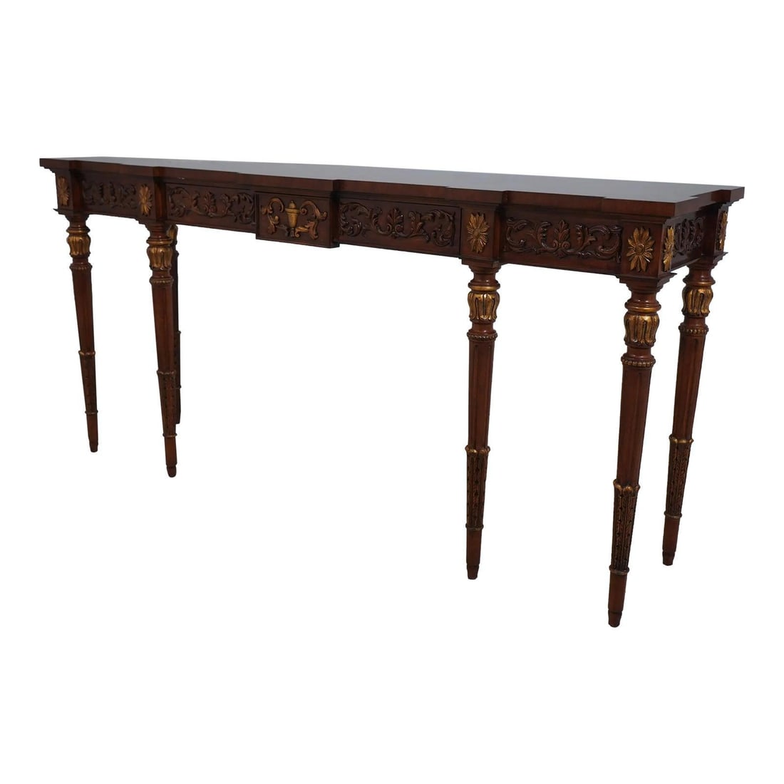 Karges Louis XVI Walnut Console Table with Gold Highlights: Karges Louis XVI Walnut Console Table with Gold Highlights This stunning French Louis XVI style console table showcases exquisite walnut craftsmanship, featuring fine carved details and elegant gold h