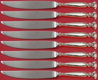 Wallace Romance of the Sea Sterling Silver 8pc Steak Knife Set: Wallace Romance of the Sea Sterling Silver 8pc Steak Knife Set This exquisite set of 8 steak knives features the enchanting 'Romance of the Sea' pattern by Wallace. Each knife boasts a sterling