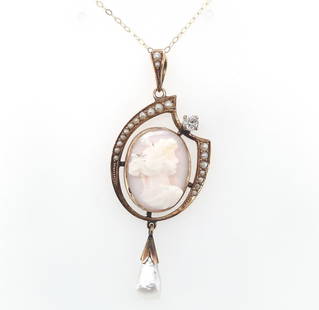 Victorian 10k Yellow Gold Angel Skin Coral Cameo Diamond Lavalier Pendant: Victorian 10k Yellow Gold Angel Skin Coral Cameo Diamond Lavalier Pendant This exquisite Victorian lavaliere pendant is crafted from 10k yellow gold and features a stunning angel skin coral cameo.