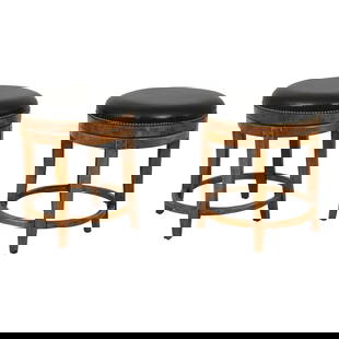 Pair Revolving Rustic Leather Stools: Pair Revolving Rustic Leather Stools Enhance your living space with this exquisite pair of Guy Chaddock revolving rustic leather stools, expertly crafted with a factory distressed design. These