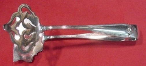 Durgin New Standish Sterling Silver Pastry Tong 5 1/2": Durgin New Standish Sterling Silver Pastry Tong 5 1/2" This exquisite pastry tong is crafted from high-quality sterling silver in the elegant New Standish pattern by Durgin. Measuring 5 1/2" in