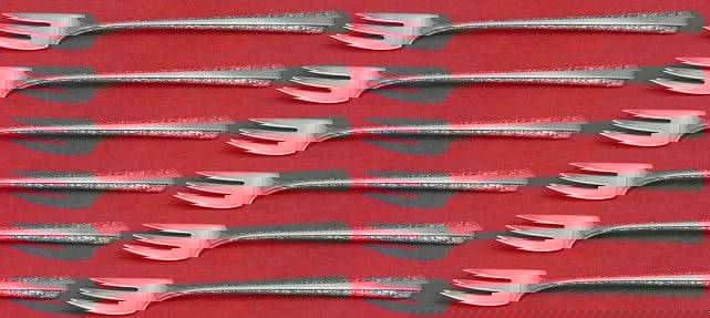 Towle Candlelight Sterling Silver Cocktail Fork Set 12 Pieces 5 3/4": Towle Candlelight Sterling Silver Cocktail Fork Set 12 Pieces 5 3/4" Enhance your dining experience with this exquisite 12-piece cocktail fork set in the elegant Candlelight pattern by Towle. Each