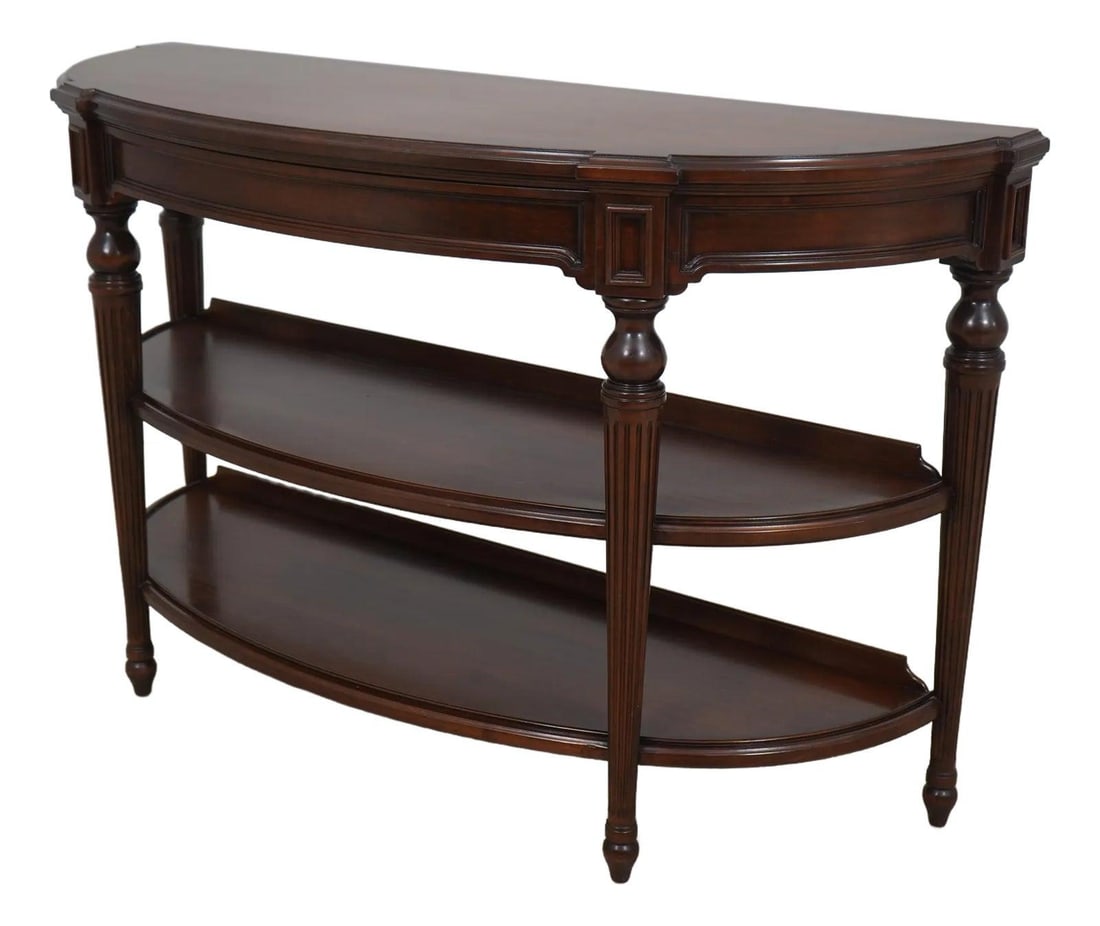 Baker Cherry Wood Tiered Demilune Console Table 56 x 20 x 34: Baker Cherry Wood Tiered Demilune Console Table 56 x 20 x 34 This elegant Baker Cherry Tiered Demilune Console Table showcases a perfect blend of style and functionality. Crafted from high-quality che