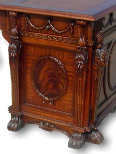 Elegant Mahogany Tudor Partners Desk with Carved Claw Feet: Elegant Mahogany Tudor Partners Desk with Carved Claw Feet This striking Mahogany Tudor Partners Desk showcases exquisite carved detailing and a traditional design that evokes the elegance of