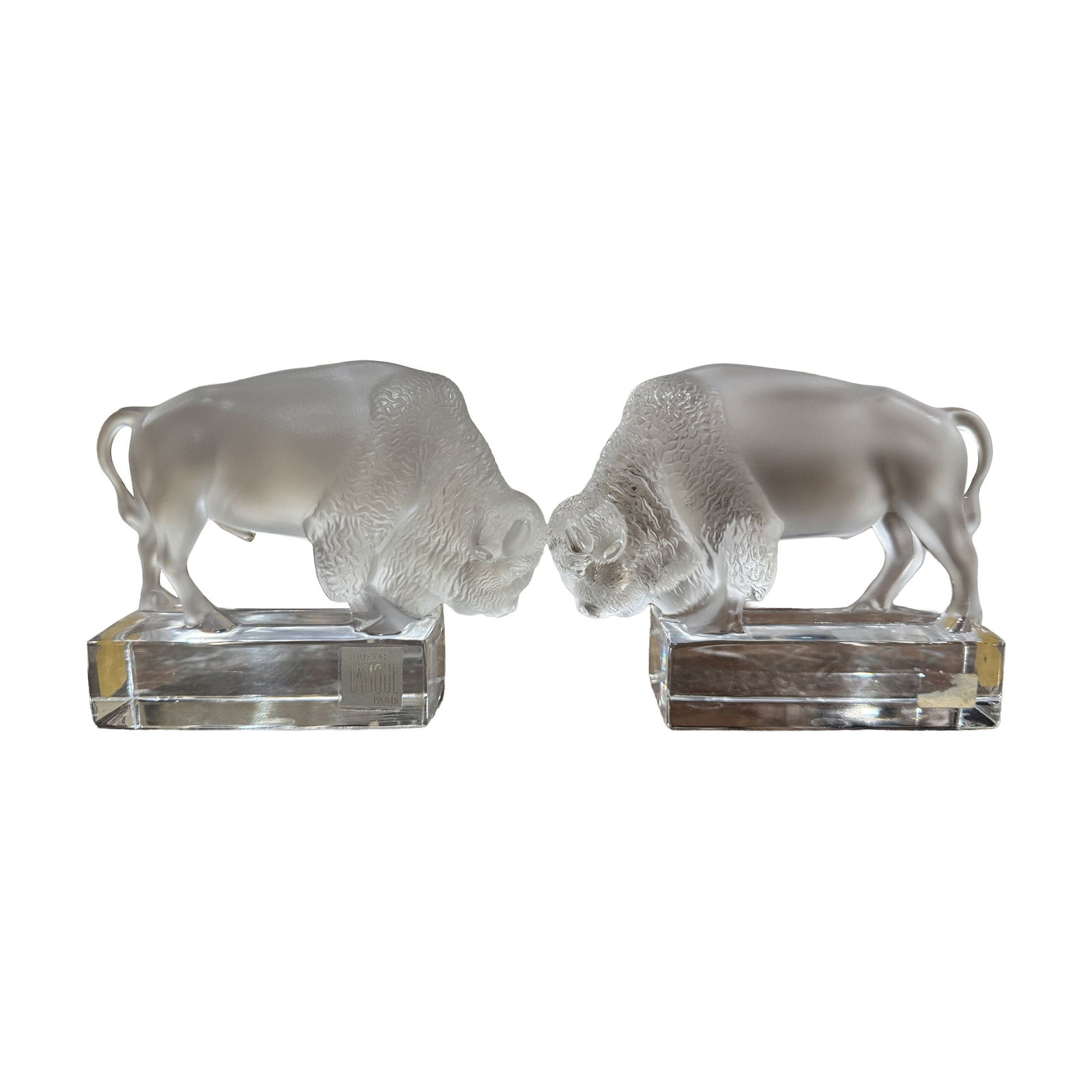 Vintage Lalique Signed Frosted Crystal Buffalo Bookends France 1980: Vintage Lalique Signed Frosted Crystal Buffalo Bookends France 1980 Enhance your space with this exquisite pair of vintage French signed Lalique frosted crystal buffalo bookends, crafted circa 1980. E