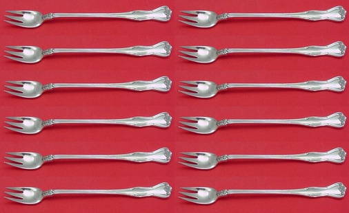 Tiffany & Co Provence Sterling Silver Cocktail Fork Set 12 Pieces 5 7/8": Tiffany & Co Provence Sterling Silver Cocktail Fork Set 12 Pieces 5 7/8" Enhance your dining experience with this exquisite 12-piece cocktail fork set from Tiffany & Co., featuring the elegant
